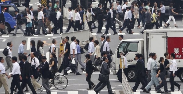 Japan s central bank shocks markets with more easing as inflation slows