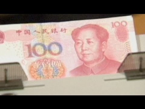 China s Economy Grows Again at a Slower Pace