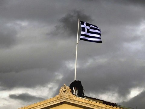 Greece faces day of reckoning as Germany says accept bailout or it s over