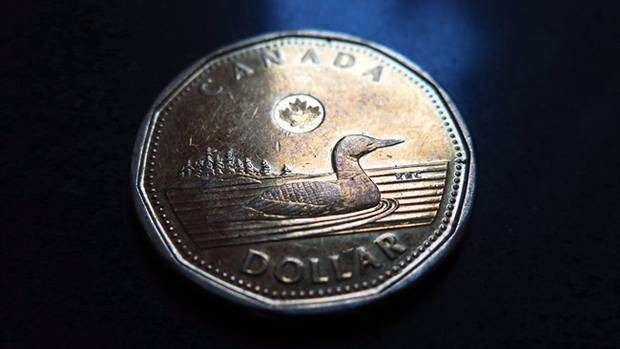 Loonie declines amid lower crude oil prices