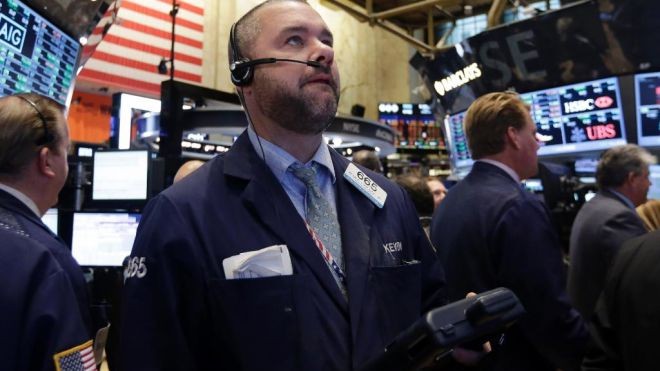 Wall Street Finishes Off Lows as Dollar Oil Sock Stocks