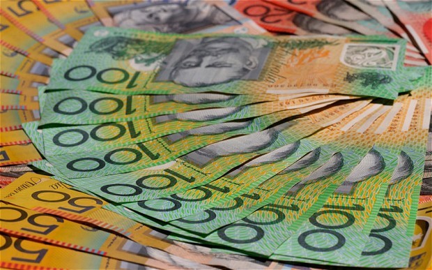 Here are 4 stocks to help you profit from a falling Australian dollar